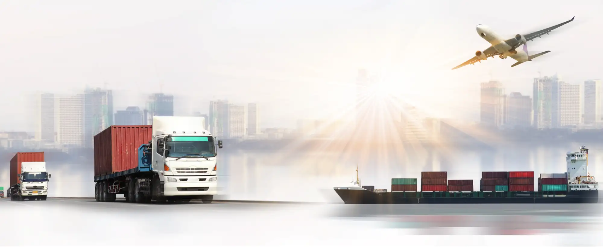 Trucks, a container ship and an aircraft moving freight across a city skyline